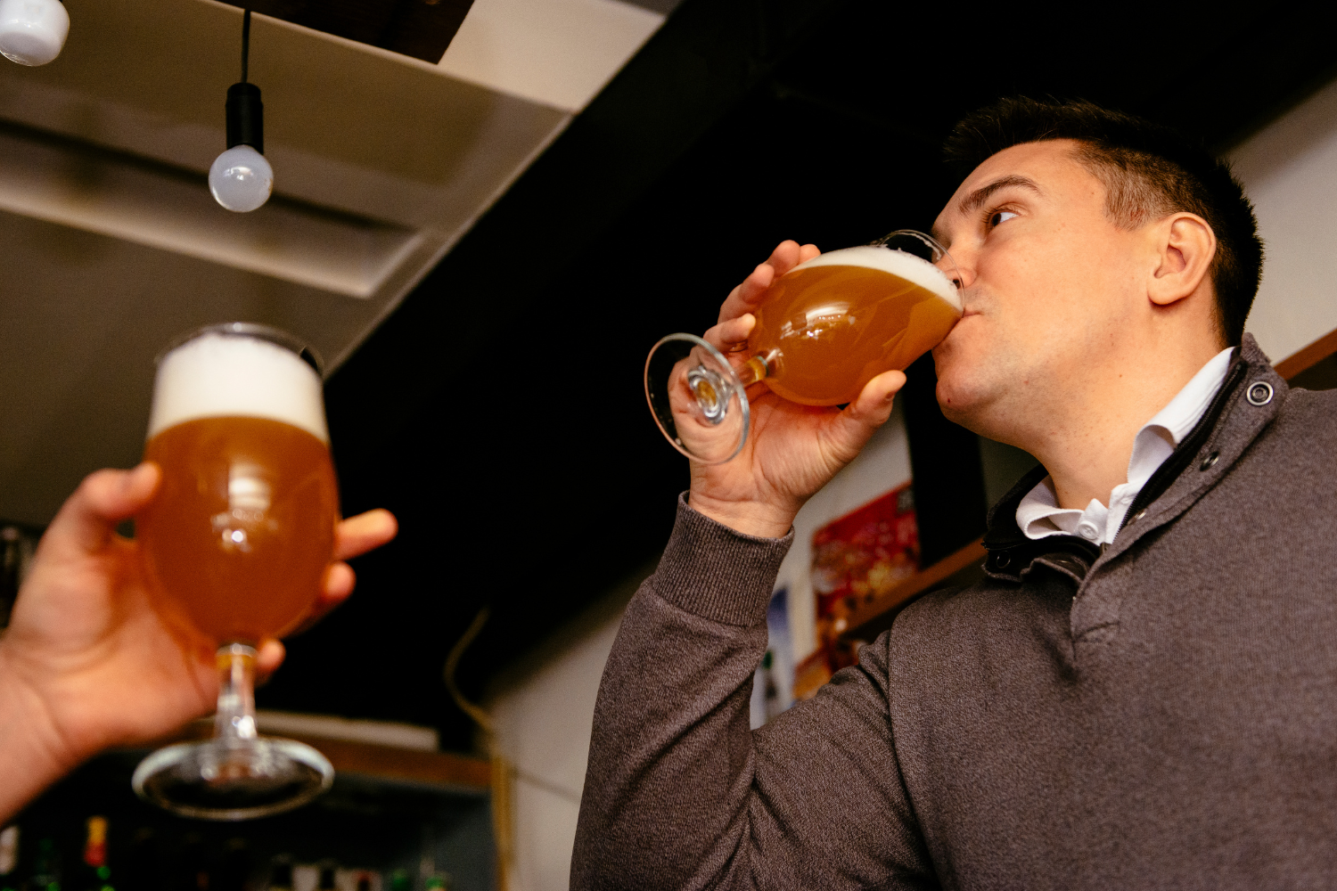 Man drinking beer.